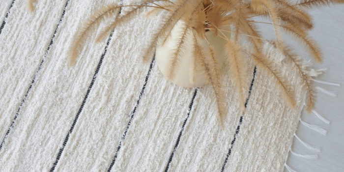 2. Small Handwoven Cream Rug by TeiaAtelier